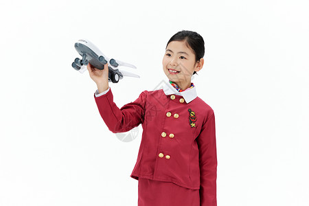 手拿飞机模型的小小空姐图片