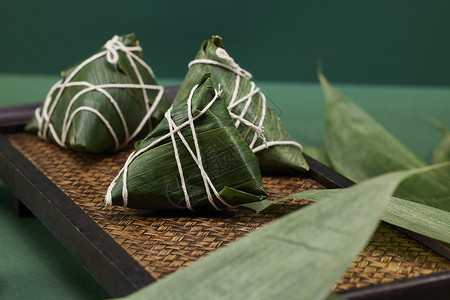 小吃美味绿色背景端午节传统粽子背景
