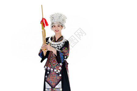 苗族女性手拿芦笙背景图片