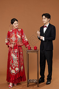 传统中式婚礼夫妻形象背景图片