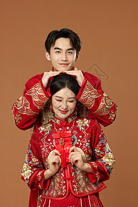 中式婚礼喜庆服装背景图片
