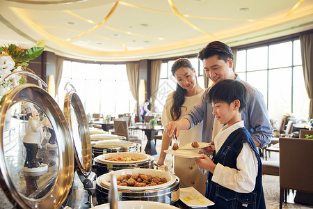 亲子酒店节假日一家人在餐厅吃饭背景