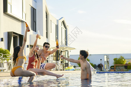 夏天游泳男女年轻男女夏日泳池度假派对背景