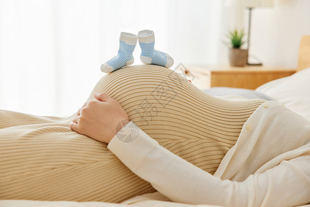 童袜期待宝宝出生的孕妇妈妈背景