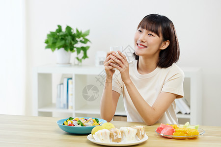 女性居家健康饮食背景图片