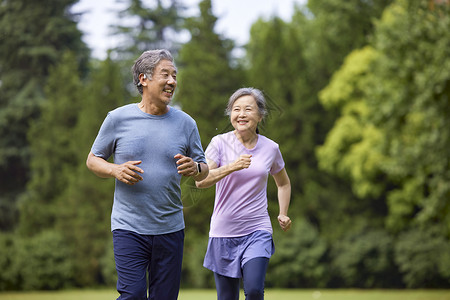 体育健康素材老年夫妇公园晨跑背景