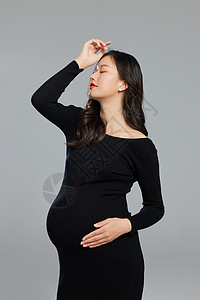 时尚孕妇抬手造型背景图片