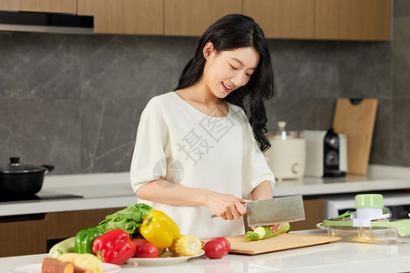 准备烹饪的健康食材厨房切蔬菜的女人形象背景