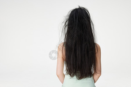 受损的头发女性头发凌乱形象背景