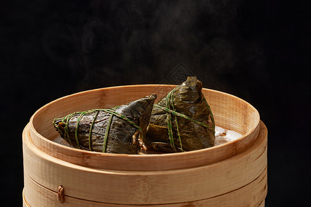 木碗粽子俩颗新鲜美味的大粽子背景