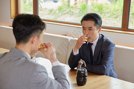 商务品茶商务男士品茶聊天形象背景