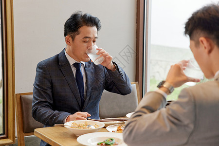 吃饭的白领商务人士吃饭喝水形象背景
