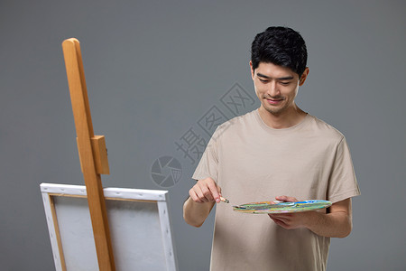 画油画的男性背景图片