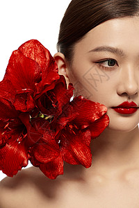 气场美女用红花点缀的气质美女造型背景