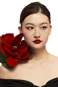 美妆黑色鲜艳的红色花朵和气质女性背景
