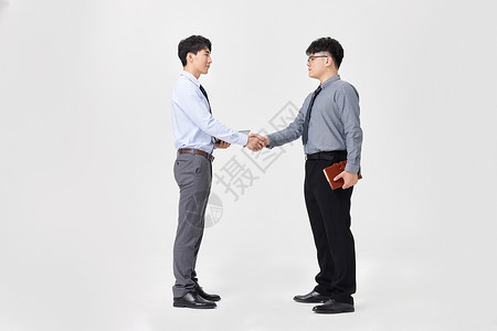 商务男性合作握手图片