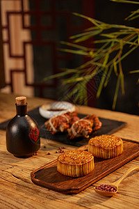 奶黄月饼中秋传统月饼与螃蟹背景