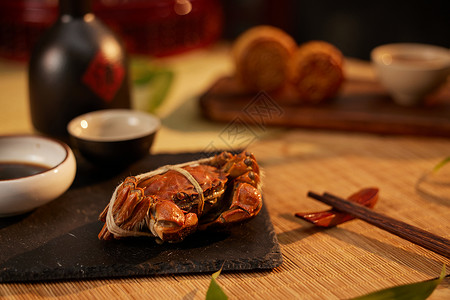六月节日传统节日中秋月饼和大闸蟹背景