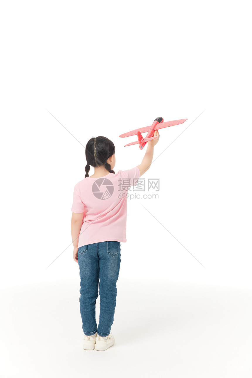 儿童手举飞机背影图片