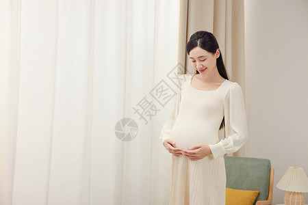 抚摸肚子的孕妇形象图片