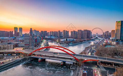 航拍夕阳下海河两岸的建筑风光背景图片