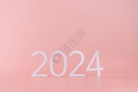 粉色背景上的数字2024背景图片