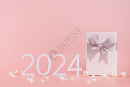 粉色背景上的数字2024背景图片