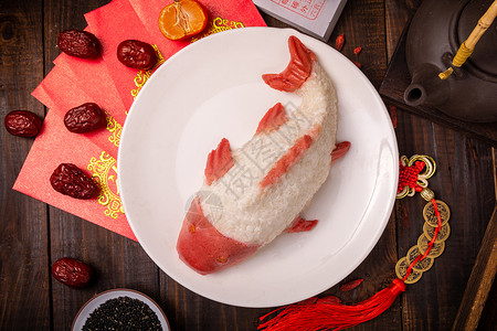 炸龙年糕韩式年糕春节期间家里的年年有鱼糯米饭背景