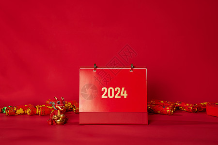 高端红色龙年日历2024日历和红色鞭炮背景