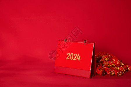 新年喜庆炮竹和2024台历背景图片