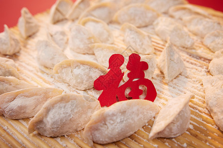 福字和新年生水饺背景图片