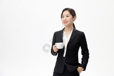 手拿文件夹自信商务白领形象图片穿着正装手拿咖啡的职业女性形象背景