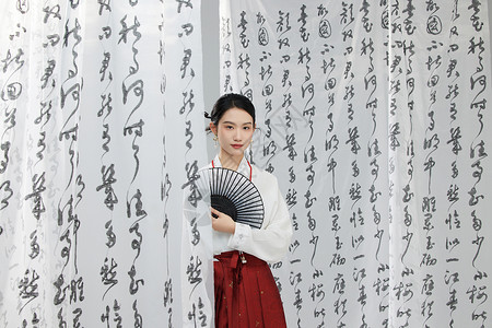 书法油纸伞书法屏风背景下的中国风美女背景
