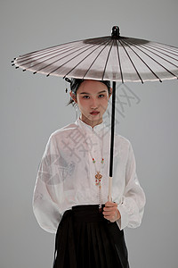 举着伞的中国风美女背景图片