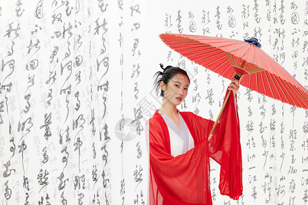 中国风美女手撑油纸伞背景图片