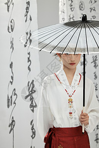 打着伞的中式古风美女背景图片