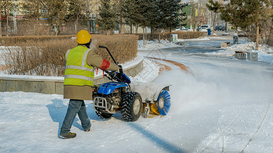 冬季冰雪清洁工背景图片