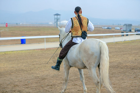 内蒙古草原马匹骑手背景图片