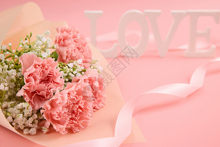 520粉色康乃馨与满天星花束浪漫背景背景图片