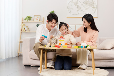 家庭教学与女儿温馨互动的年轻父母背景