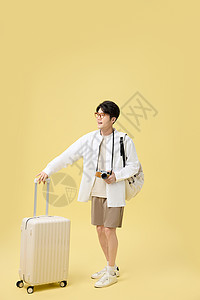 帅哥和行李箱年轻男大学生旅游形象背景