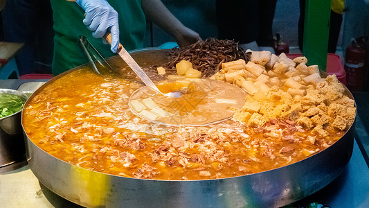 美食煮关东夜市美食小吃港式喷泉牛杂背景