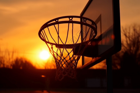 夕阳下的篮球架背景图片