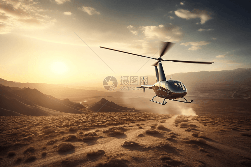 在沙漠上空飞行的直升机图片