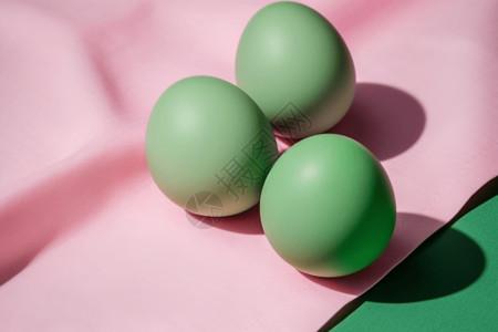 绿色毛线球静物复活节彩蛋背景设计图片
