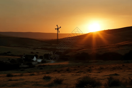 夕阳山丘和风车背景图片
