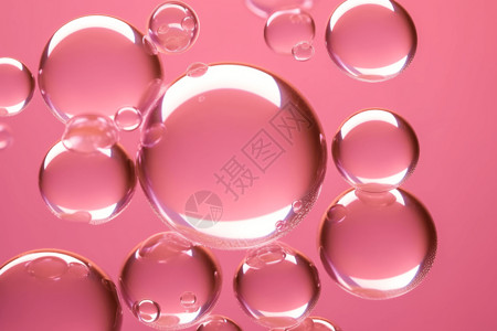 粉色背景上的气泡背景图片