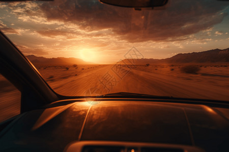 美丽的沙漠一辆自动驾驶汽车在广阔而毫无生气的沙漠中行驶，美丽的日落提供了温暖的橙色色调。以电影的感觉从低角度。设计图片