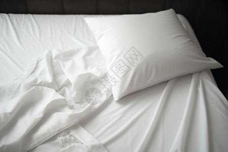 酒店白色床单枕头特写镜头高清图片