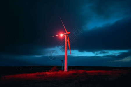 夜晚的风力涡轮机背景图片
